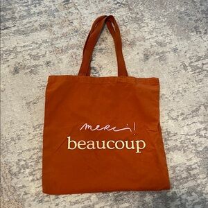 Orange Tote Bag with Merci Beaucoup Print